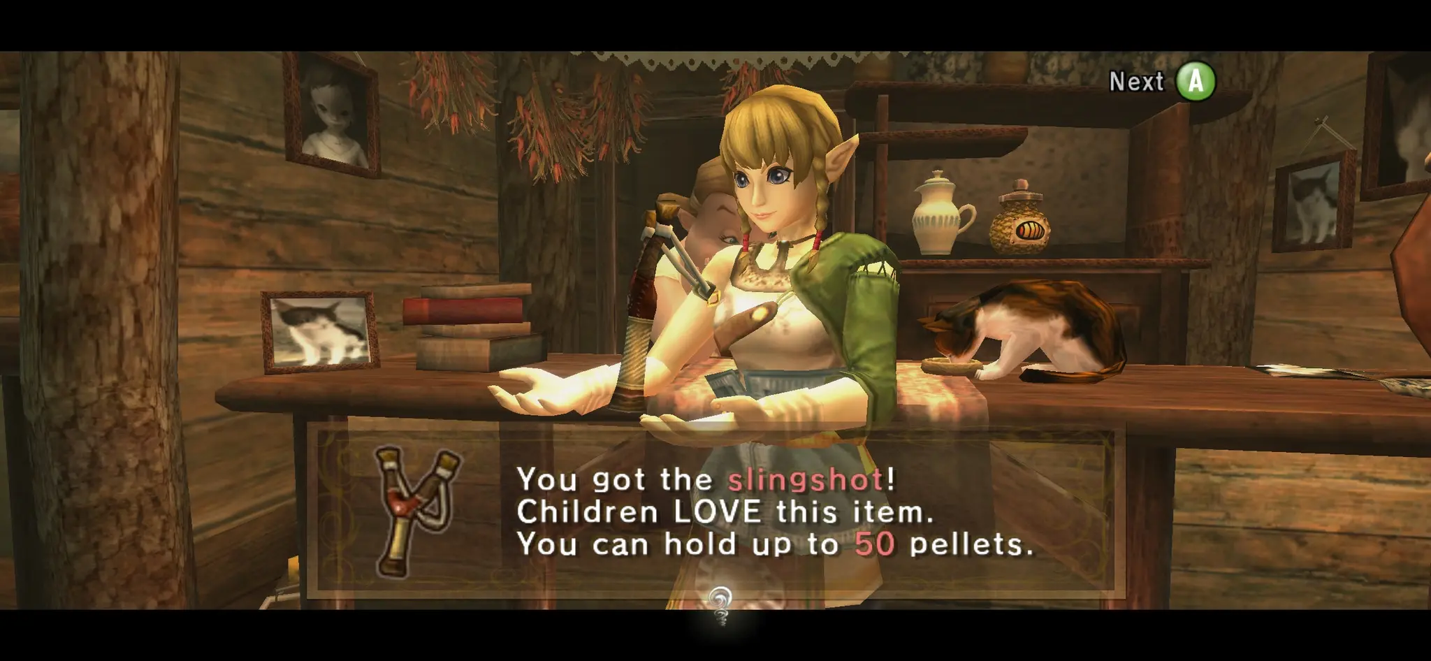 Linkle (fem/girl Link) in Legend of Zelda: Twilight Princess excitedly holding a new item:
“You got the slingshot! 
Children LOVE this item.
You can hold up to 50 pellets.”
